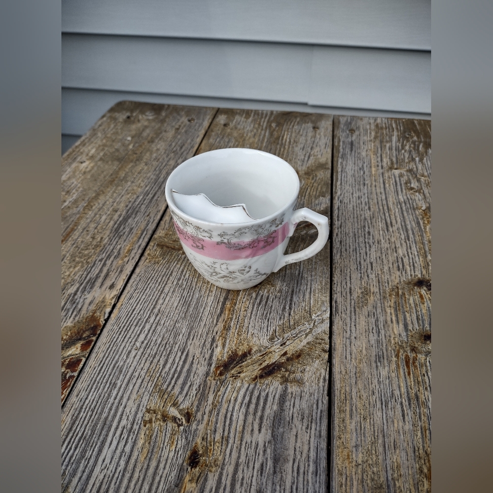 Antique mustache cup